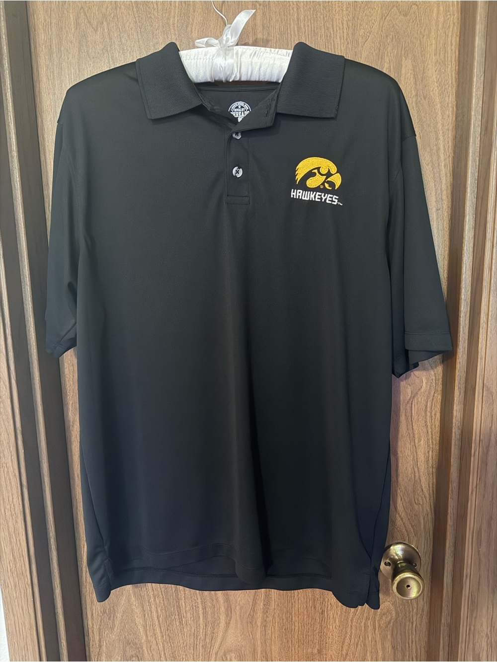 Rivalry Threads Black Polo with Yellow Hawkeyes Logo